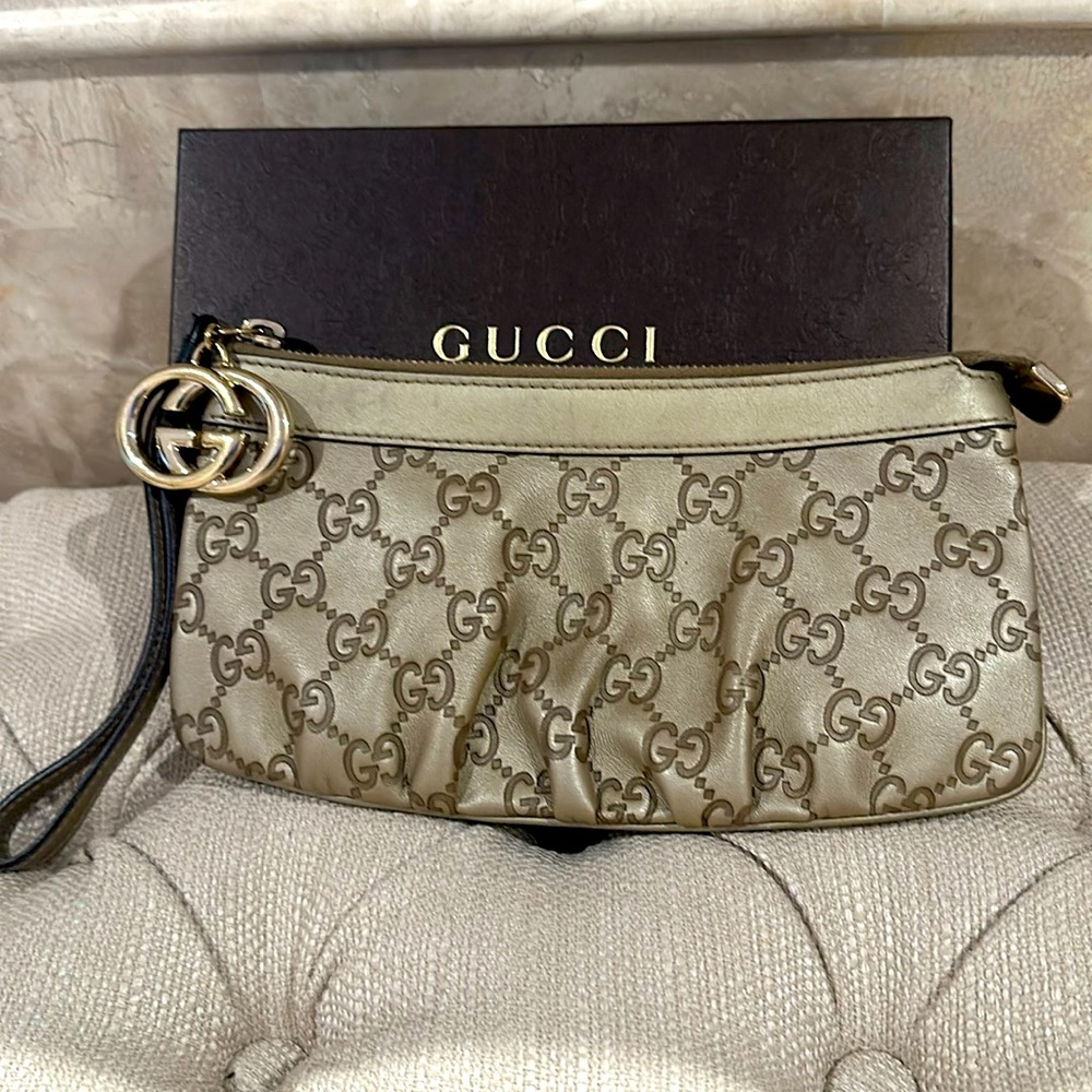 100% Authentic Gucci wristlet.
